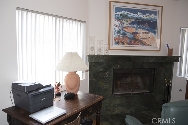 Family room view and fireplace.