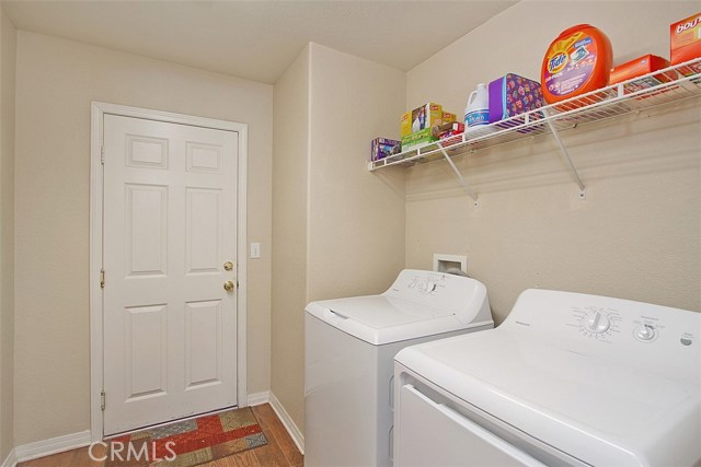 Laundry room between garage and kitchen