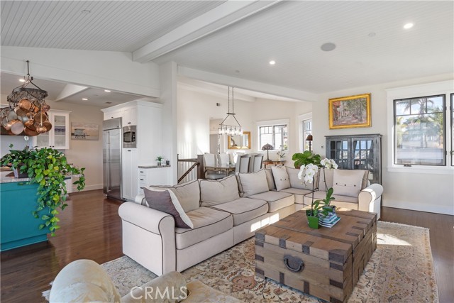 Open-concept floor plan connects Living Room with Dining Room and Kitchen