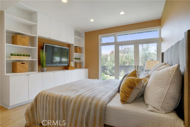 Floor to ceiling windows provide pretty views of the back yard and greenery.