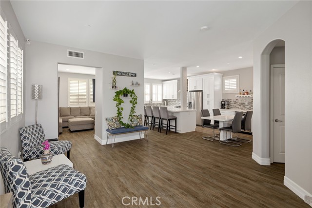 greeted by an open living floor plan greeted by an open living floor plan