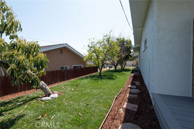 EAST SIDE OF HOUSE, LOOKING TOWARD FRONT (S) - MORE FRUIT TREES