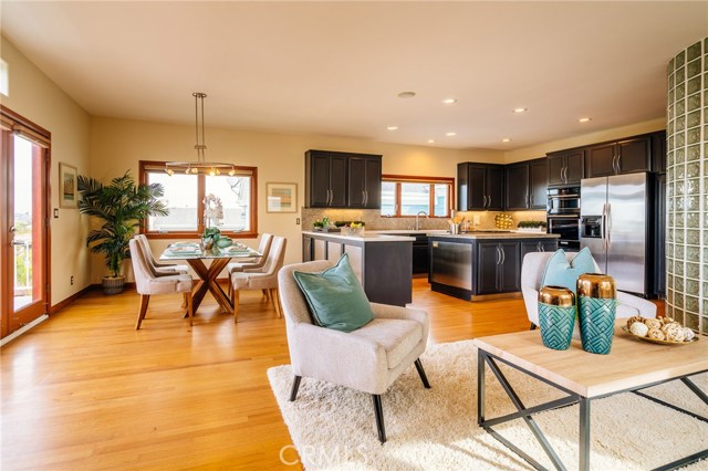 View of kitchen and breakfast area from family room