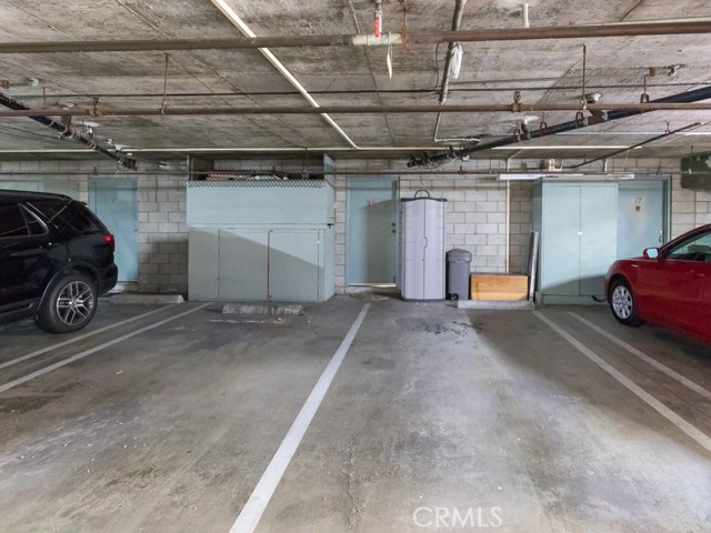 Two parking spots in gated garage with direct access to unit plus storage cabinets on both sides
