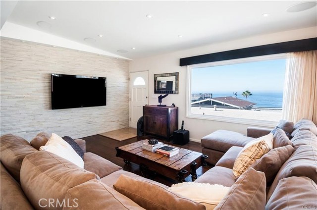 Upstairs Living Room with Large window with ocean view