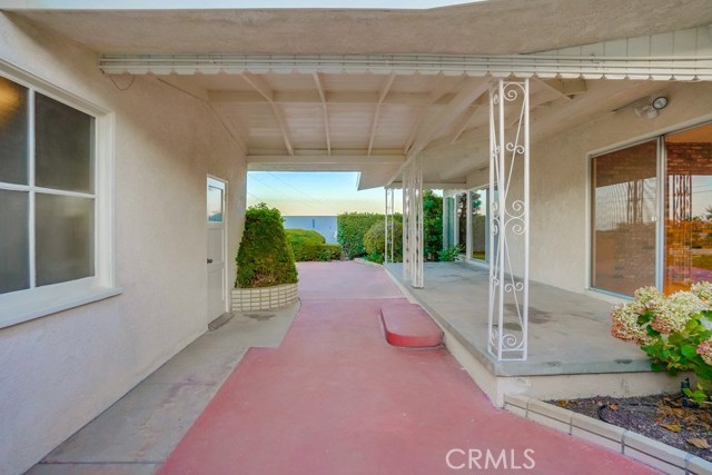 Large Patio Area for entertaining separating house and garage.
