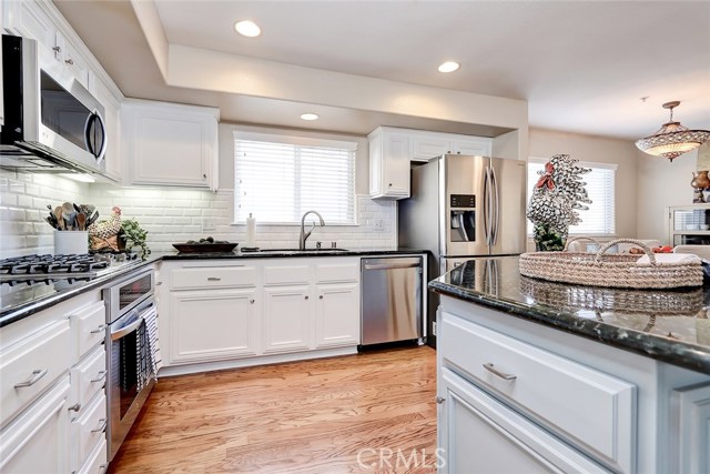 A plethora of storage with soft-close cabinets make this kitchen a chef's dream.
