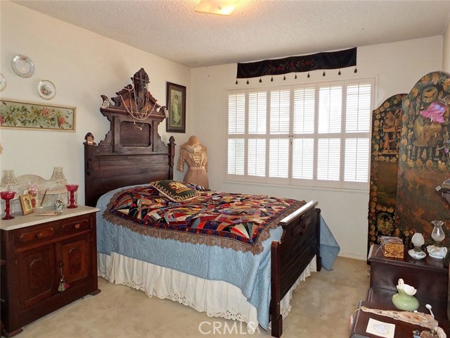 Bedroom with Shutters with Lots of Light