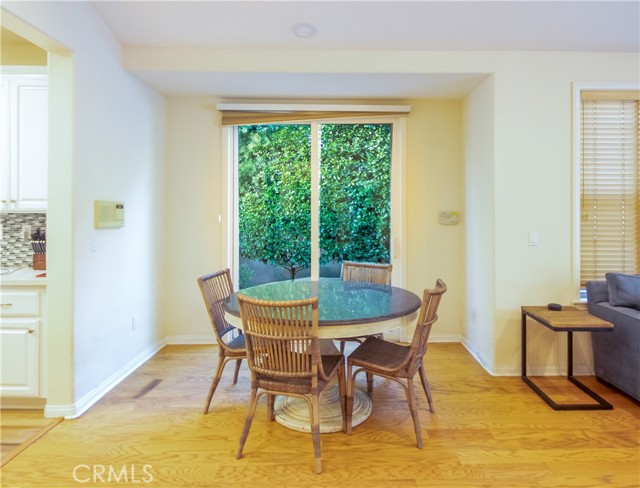 nook near kitchen with doors to the side yard