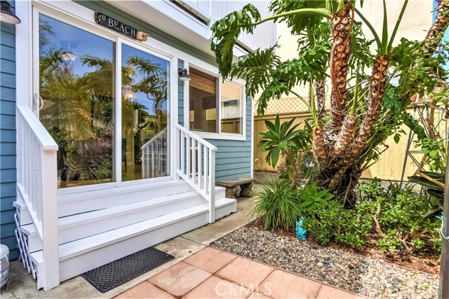 A rear sliding door off of the family room leads out to the lush rear yard.