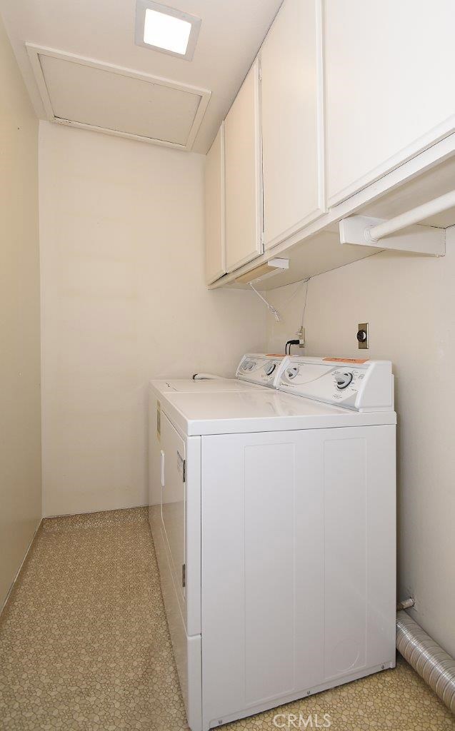 Laundry Room on Upper Level with Attic
