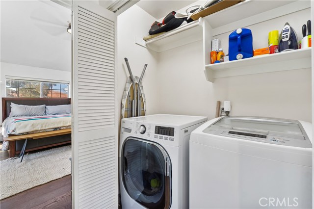 In-closet laundry with storage on same level as the primary bedroom suite