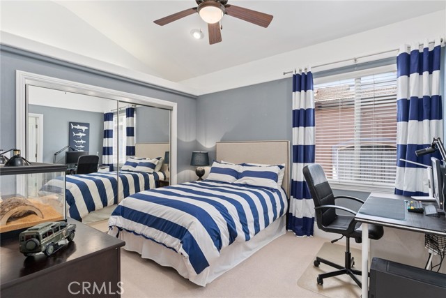 Bedroom 3 with vaulted ceilings.