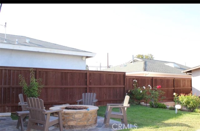 Backyard with a firepit.