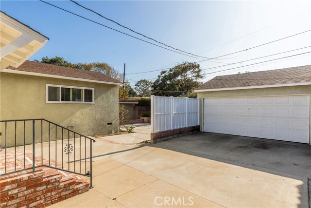 Two Car Detached Garage with Built-in Shelving
