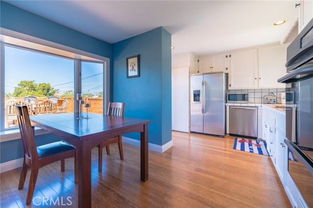 View of dining room and kitchen.