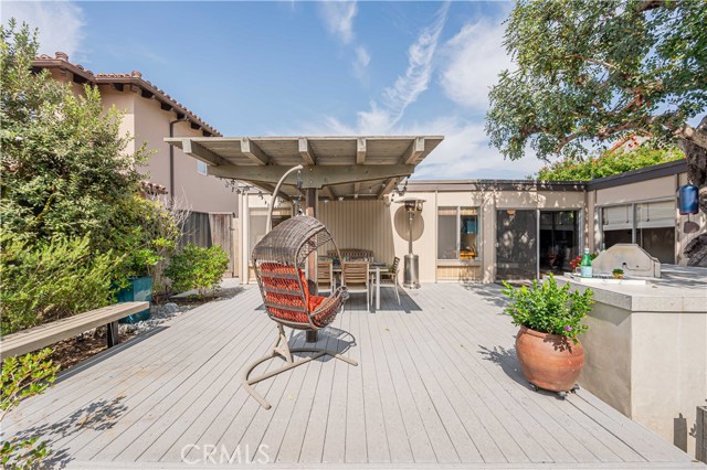 Backyard deck with view toward house