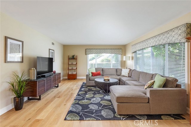 Large, sunny formal living room faces front or South. 7
