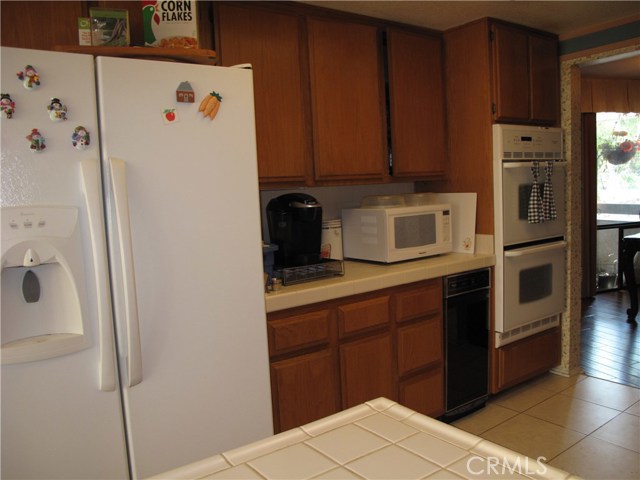 Double oven.  Trash compactor is waiting for a wine fridge!