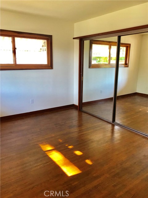 Master bedroom - hardwood flooring - hardwood detailing