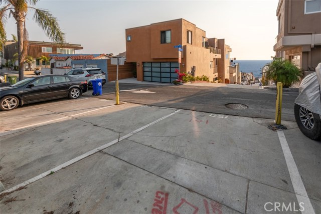 Two Parking Spots in Addition to the Two Single Car Garages