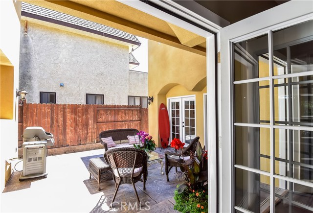 Additional outdoor space! This courtyard is great for barbecuing.