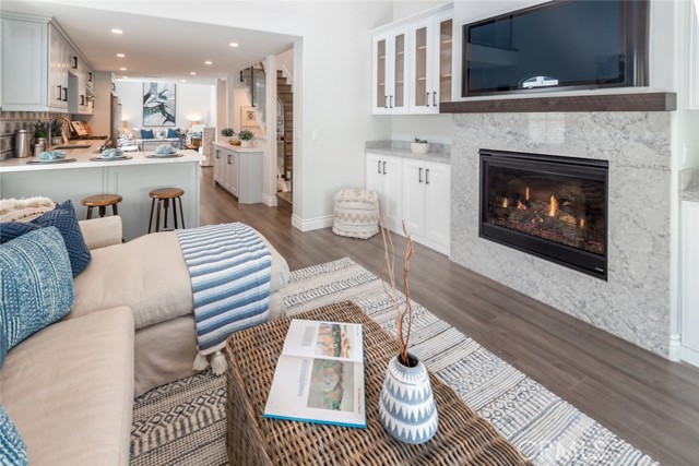 Family Room Fireplace Open to Kitchen