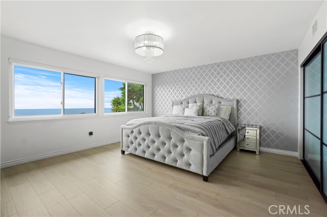 Primary bedroom suite with ocean view