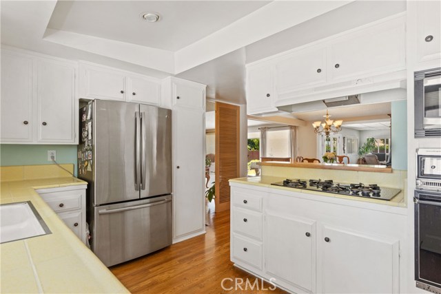 Stainless Steel Refrigerator. and Gas Cook Top