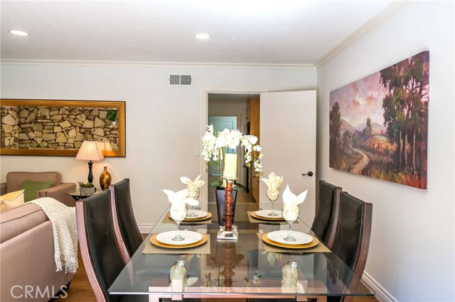 Formal dining room area off kitchen and adjacent to living room
