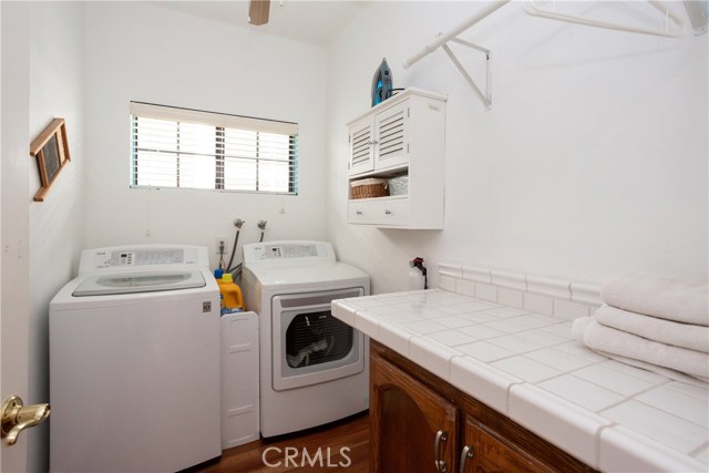 Laundry Room on First Level.  There is also Laundry on 2nd Level in Master Closet.