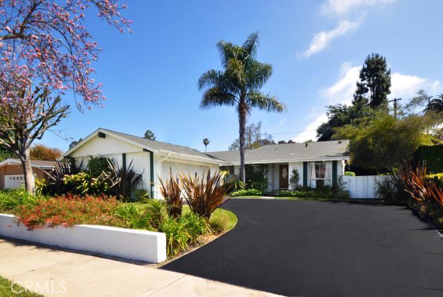 Front of the house with resurfaced driveway