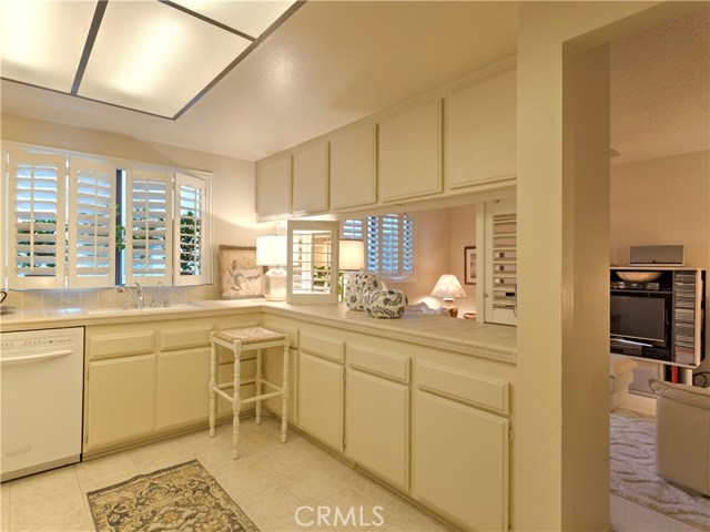 Another view of kitchen next to family room