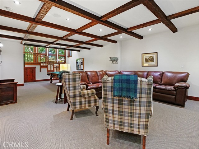 Rec Room showing the pool table area and stairs to the side gardens and lawn.