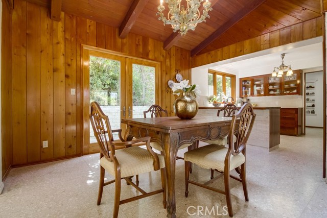 Dining area opens to kitchen and living spaces