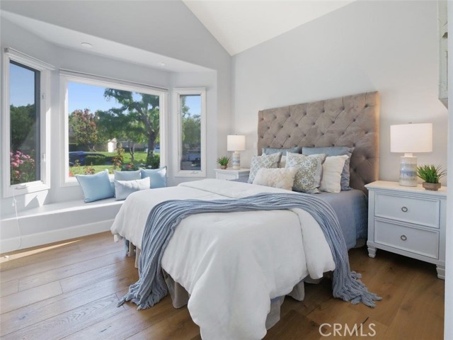 Front bedroom with bay windows and sitting area by the windows