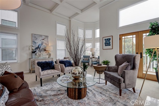 French doors lead to a sunny west facing balcony overlooking Carver.