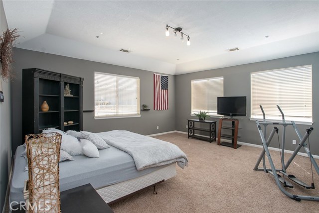 This is actually the HUGE bonus room!  Perfect for a game room with a pool table or a big TV room.  They currently have a bed in there but it is not a bedroom (no closet).  There are 4 other bedrooms plus an office.