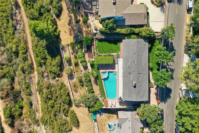 Aerial view of home with orchard