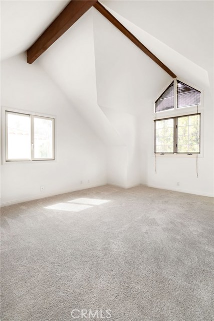 NW facing bedroom has bright afternoon sun. Love the volume afforded by the vaulted ceilings in all upstairs bedrooms.