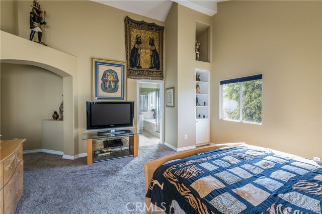 Master Suite w/ Built-In Bookcase & Entrance to Master Bath