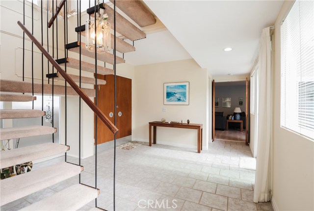 staircase leading up to master bedroom area