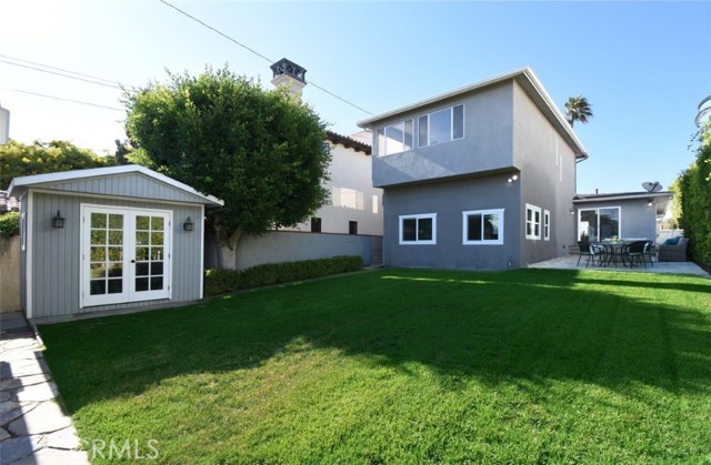 Beautiful large grassy backyard