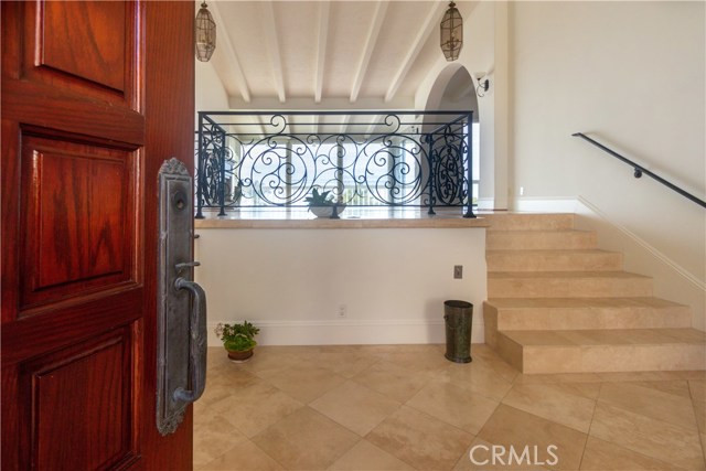 Formal entry landing - the mid level has a second Master suite and the kitchen.