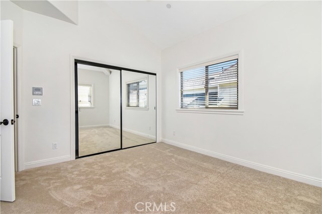 bedroom 3 with closet angle... note the high ceilings!