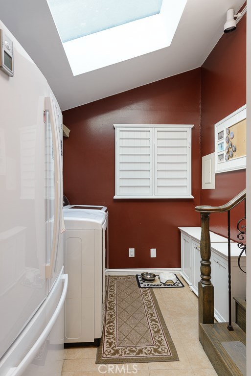 Laundry room with skylight