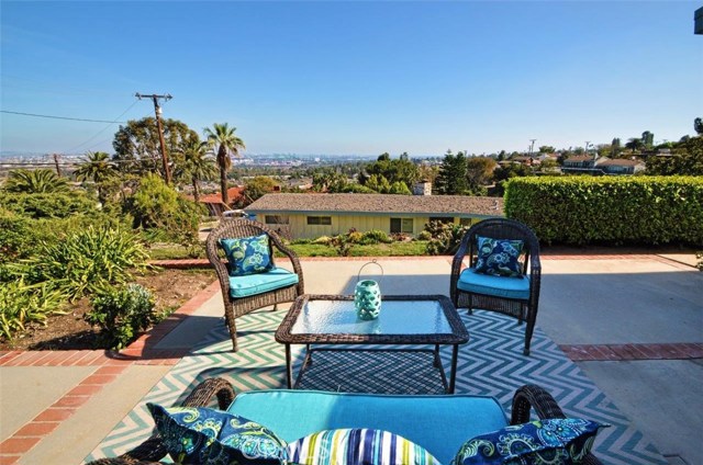 Patio in side yard showing view.