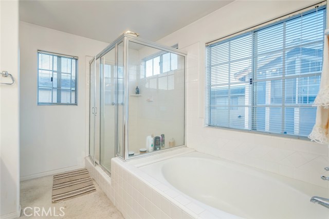 Oval Tub and walk-in Shower in the Master Bath