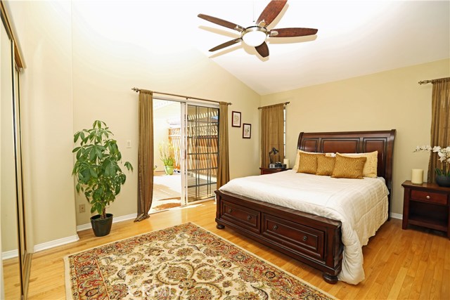 Master suite with dramatic vaulted ceiling.  Direct access to private deck.
