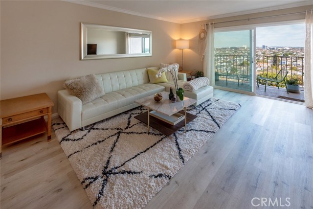 Views are yours to enjoy from both inside and out. The sliding glass door opens on to your balcony with incredible views of the mountains, city lights, Hollywood sign, DTLA, Harbor and Long Beach!